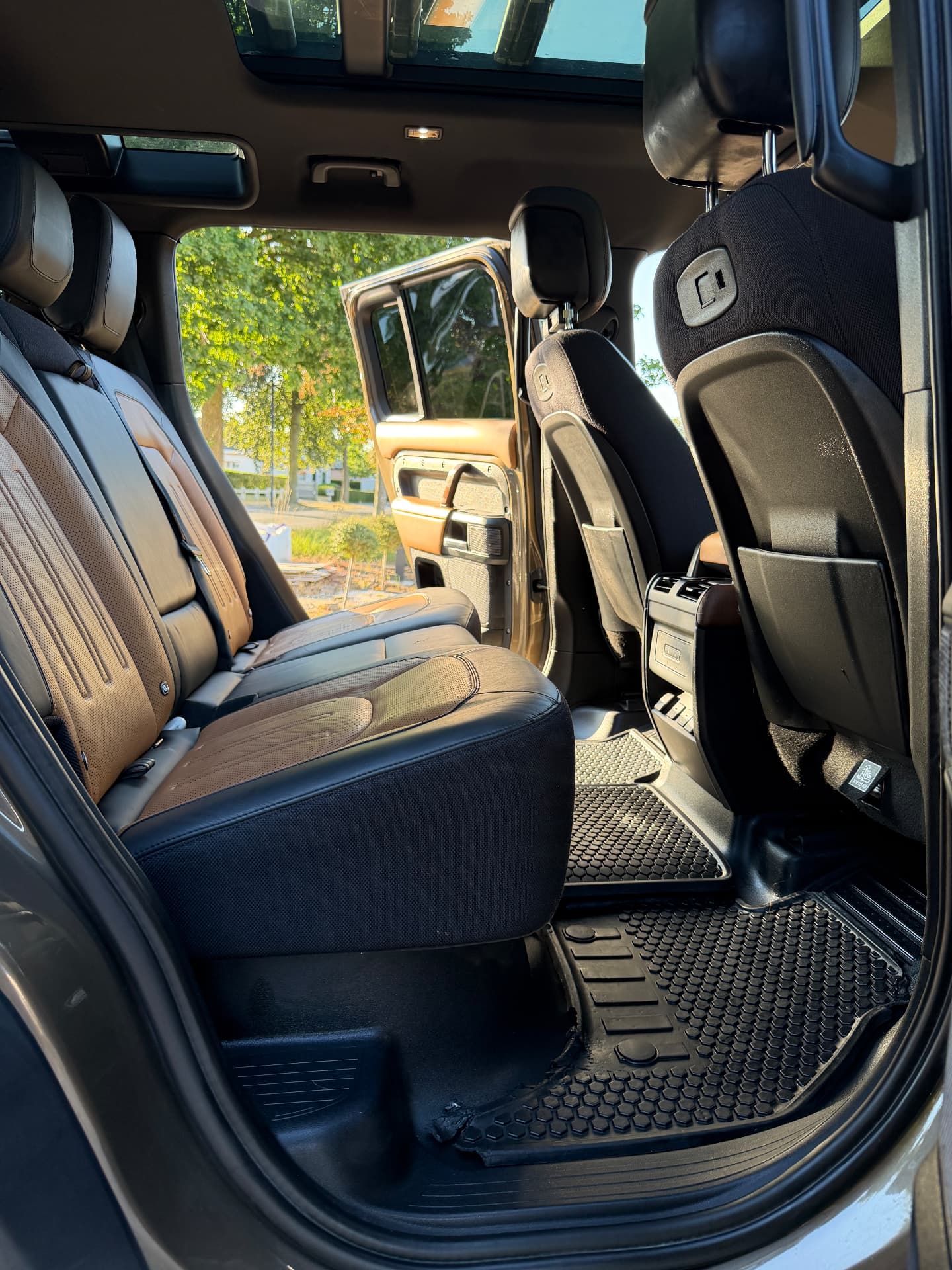Land Rover Defender rear seats and cleaned floor mats