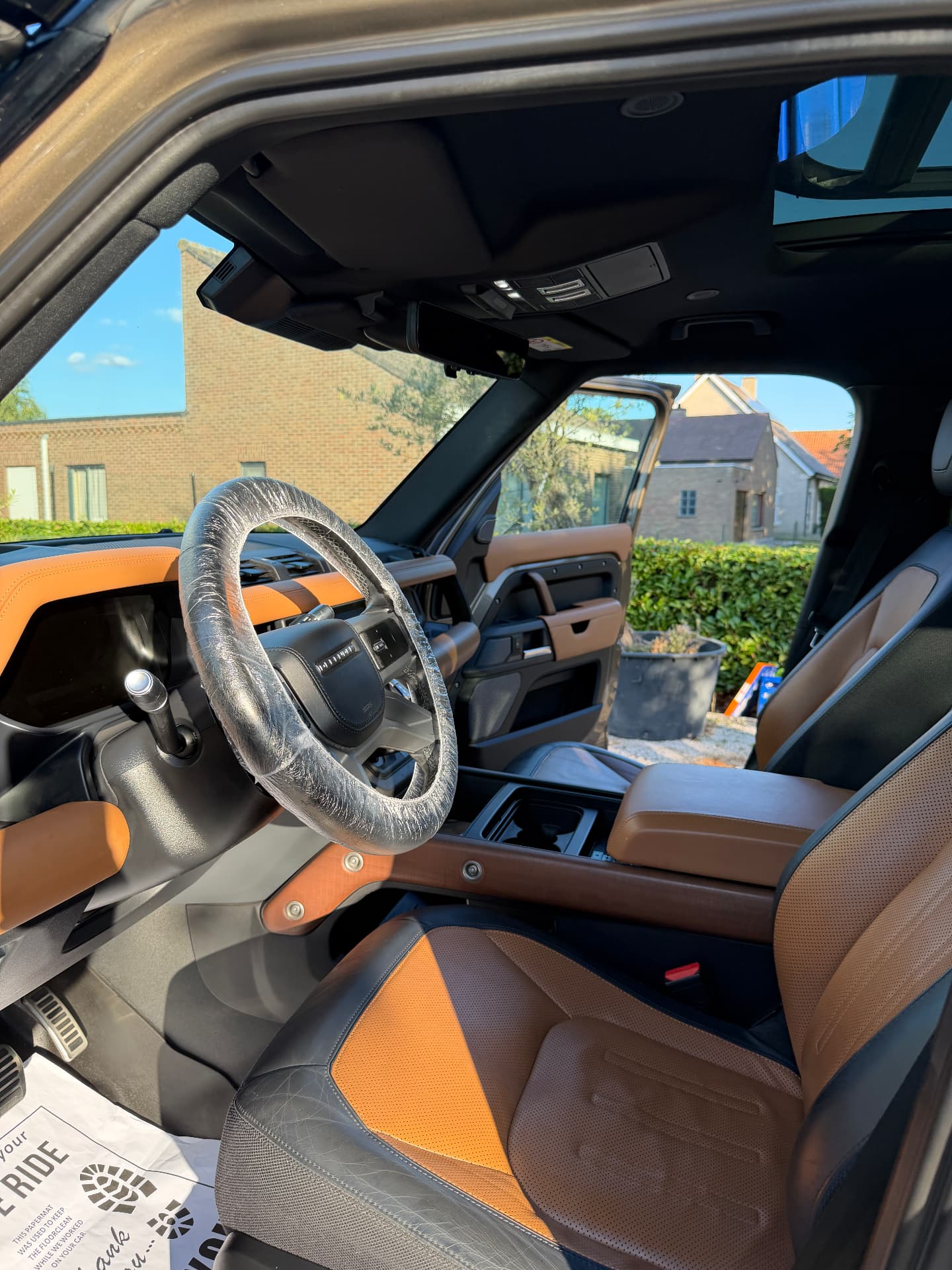 Land Rover Defender front cabin detailed with protected steering wheel