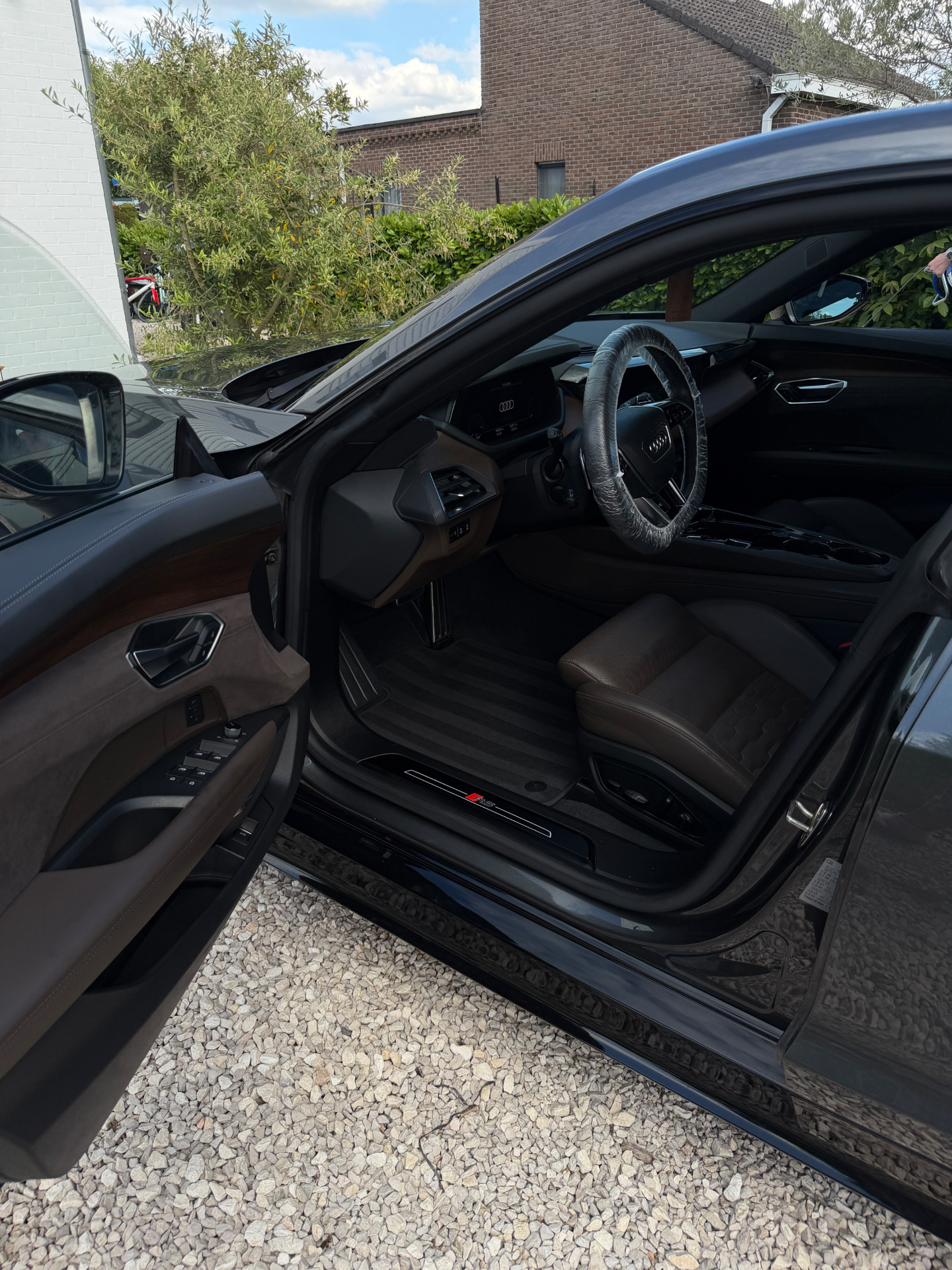 Audi e-tron GT interior with door open after detailing